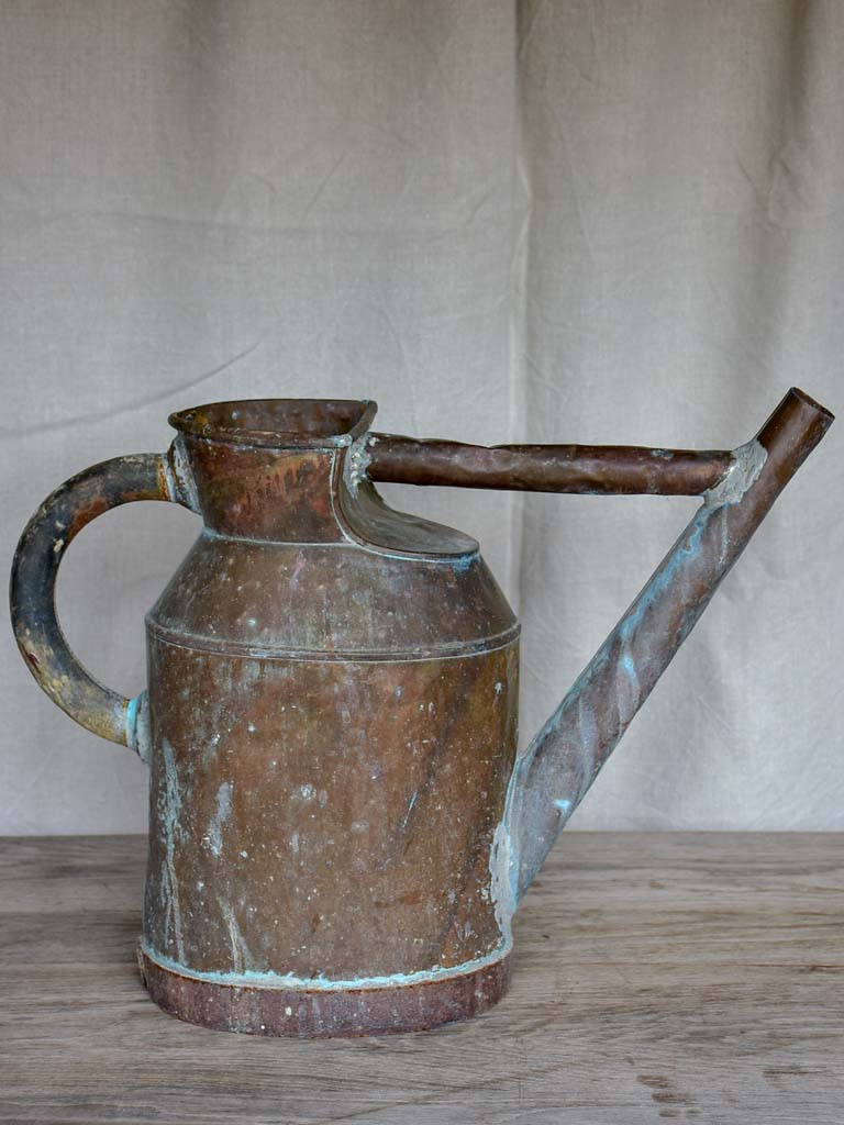 Antique French copper watering can with brace