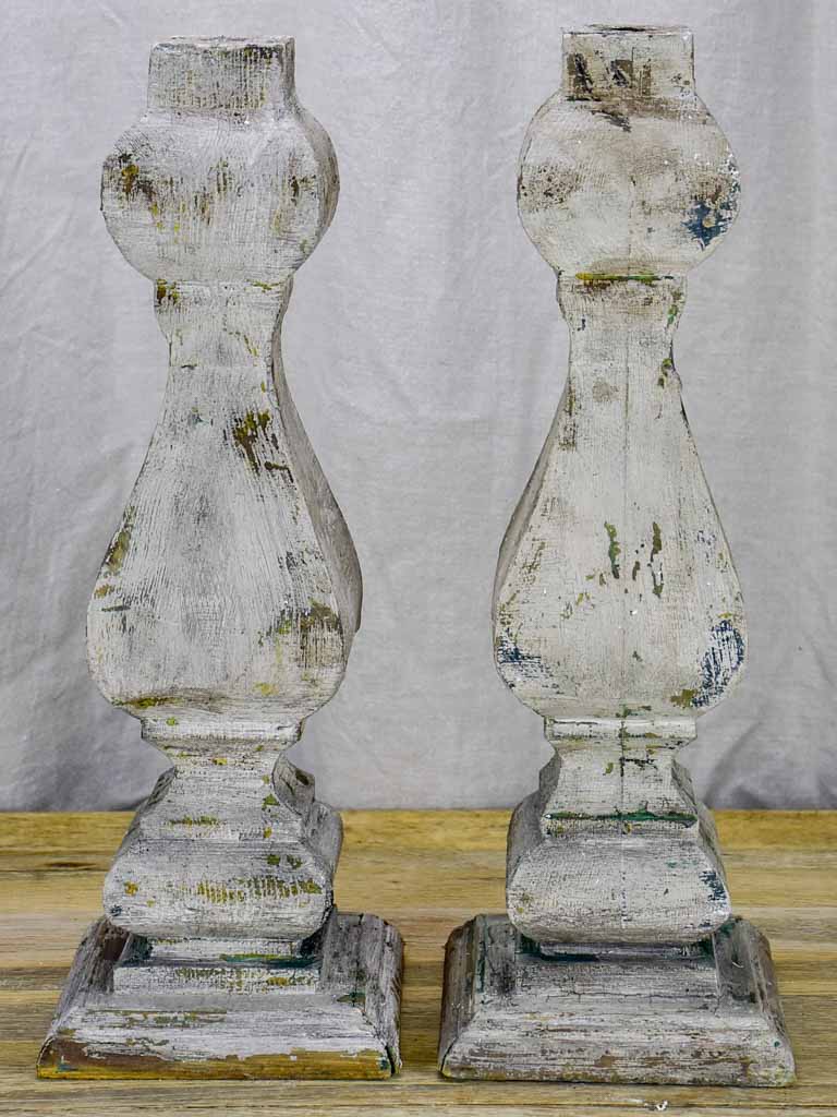 Pair of salvaged wooden decorative elements / candlesticks with grey patina