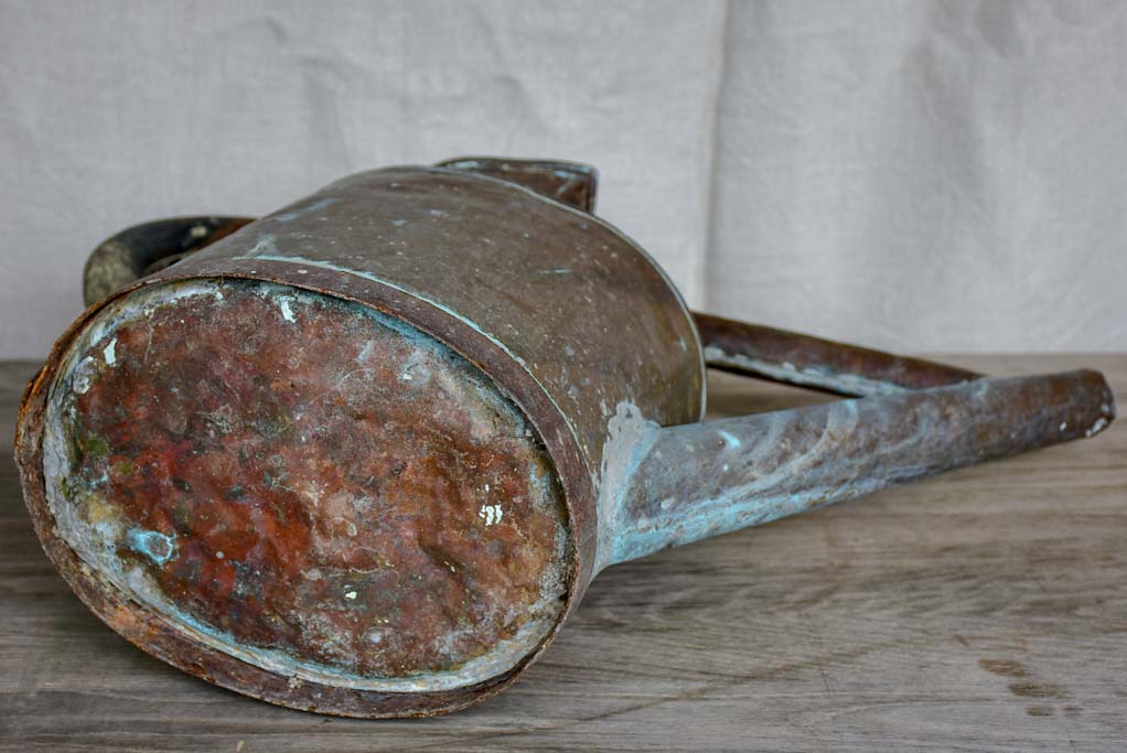 Antique French copper watering can with brace