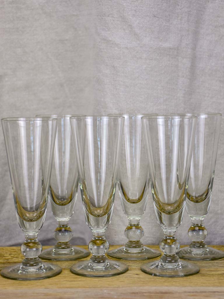 Six early 20th Century French champagne flutes - blown glass