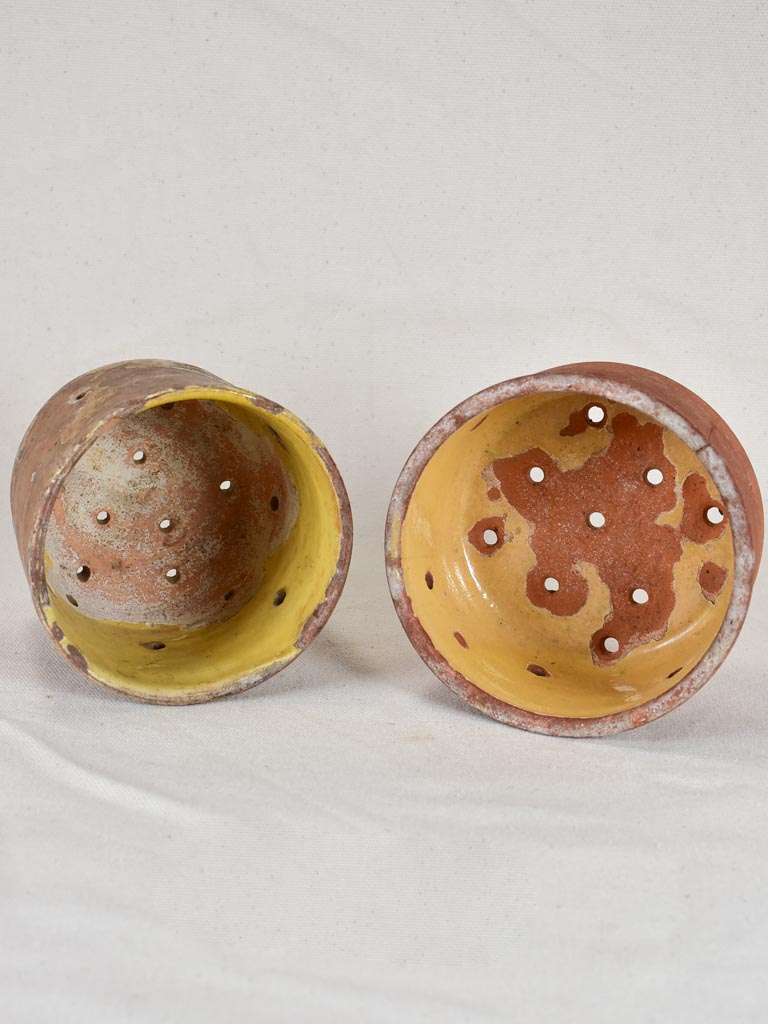 Two antique French terracotta cheese strainers