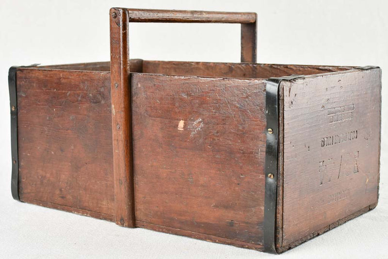 Antique wooden box for paintbrush storage