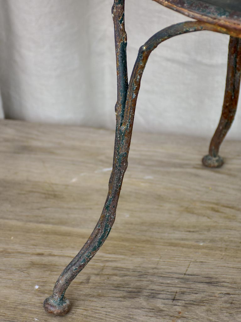 Antique French garden chair with branch - like back