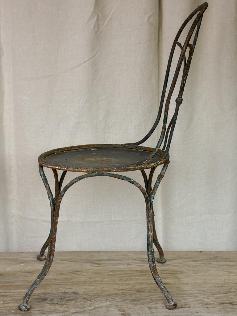 Antique French garden chair with branch - like back