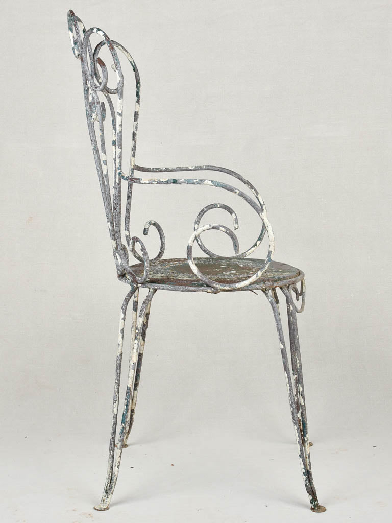 Distressed finish wrought iron table