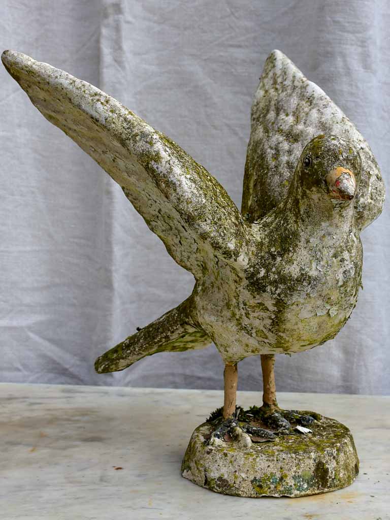 Early 20th century sculpture of a bird with outstreatched wings