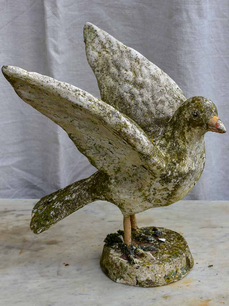 Early 20th century sculpture of a bird with outstreatched wings