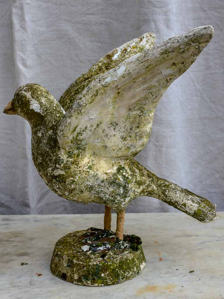 Early 20th century sculpture of a bird with outstreatched wings