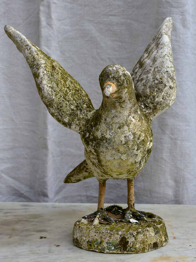 Early 20th century sculpture of a bird with outstreatched wings