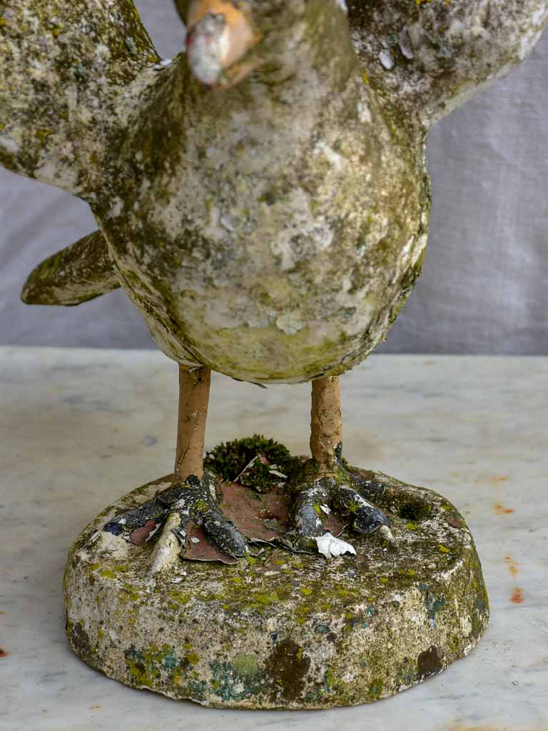 Early 20th century sculpture of a bird with outstreatched wings