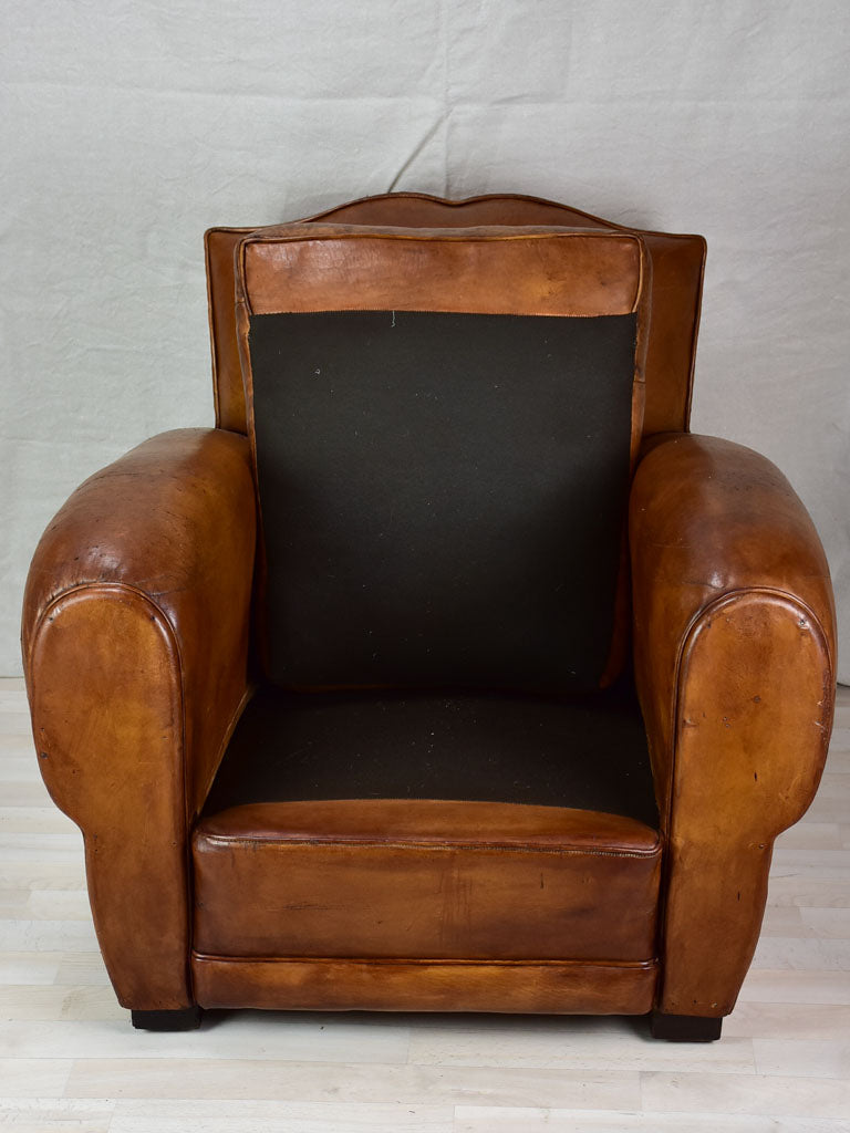 Large 1950's French leather club chair with mustache back and barrel arms