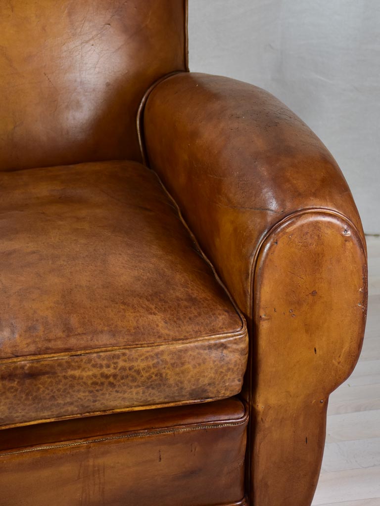 Large 1950's French leather club chair with mustache back and barrel arms