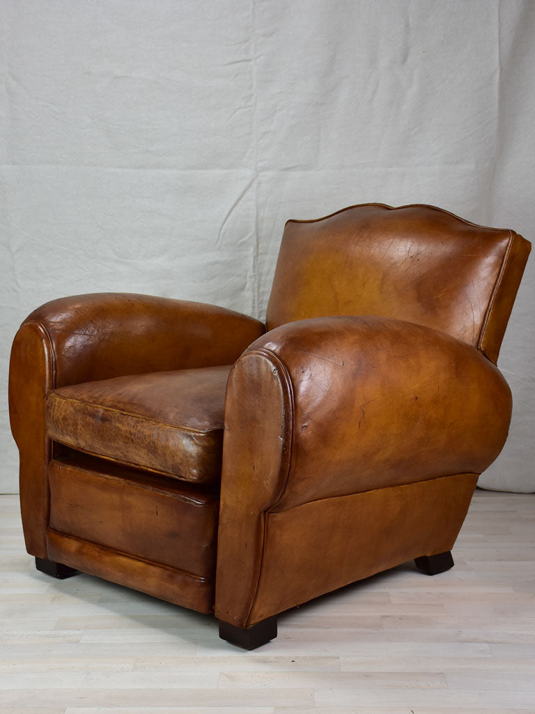 Large 1950's French leather club chair with mustache back and barrel arms
