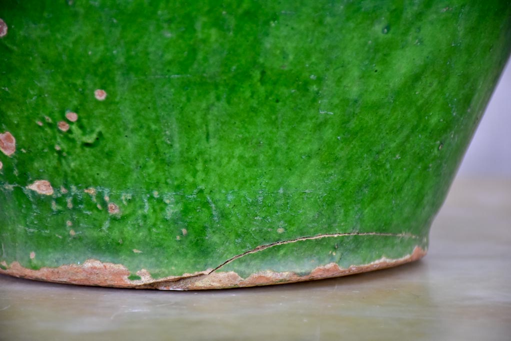 Antique French water jug with green glaze