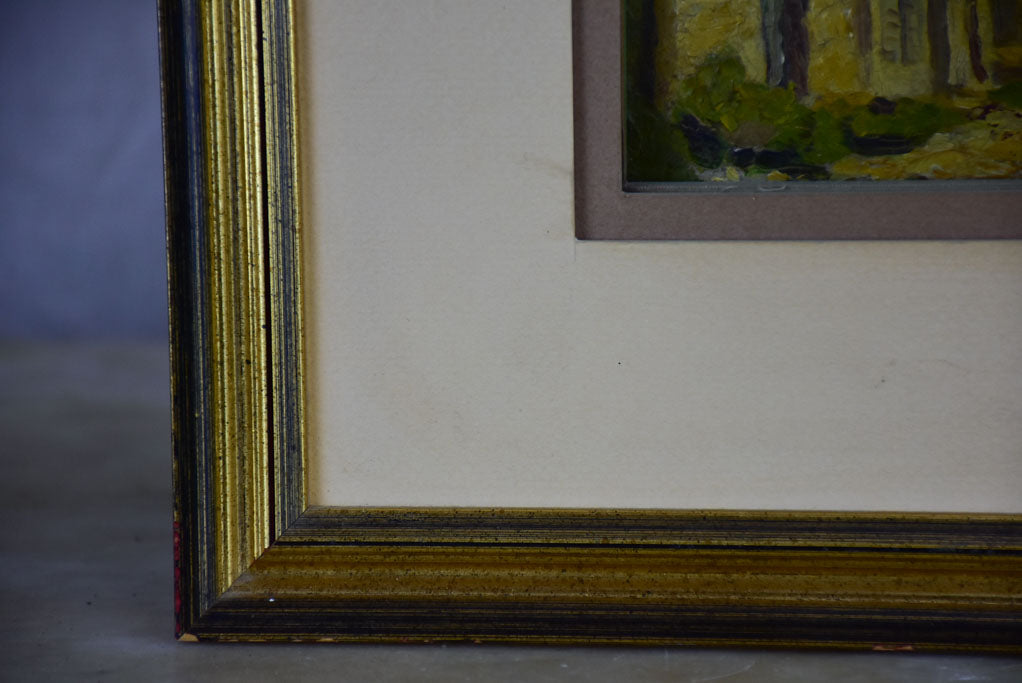 Small antique French painting of a village 15 ¾" x 12 ½"