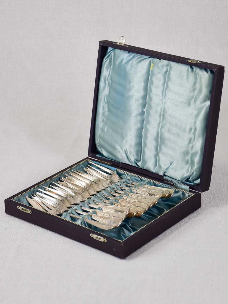 Set of 12 silverplate fish forks - WMFN hallmark
