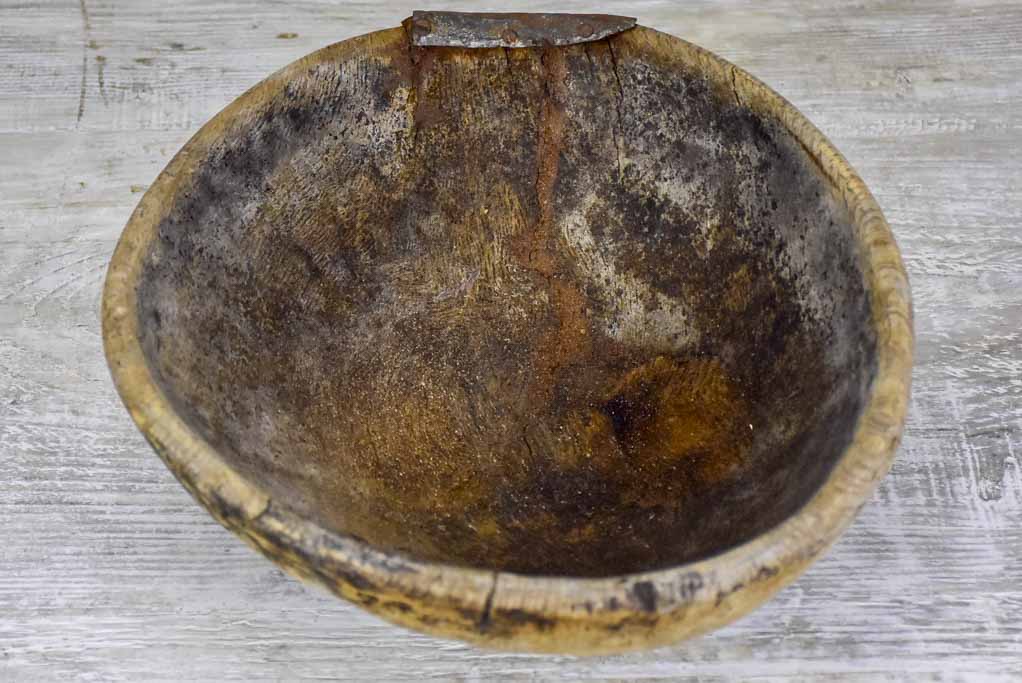 Primitive wooden bowl from south west France with repairs