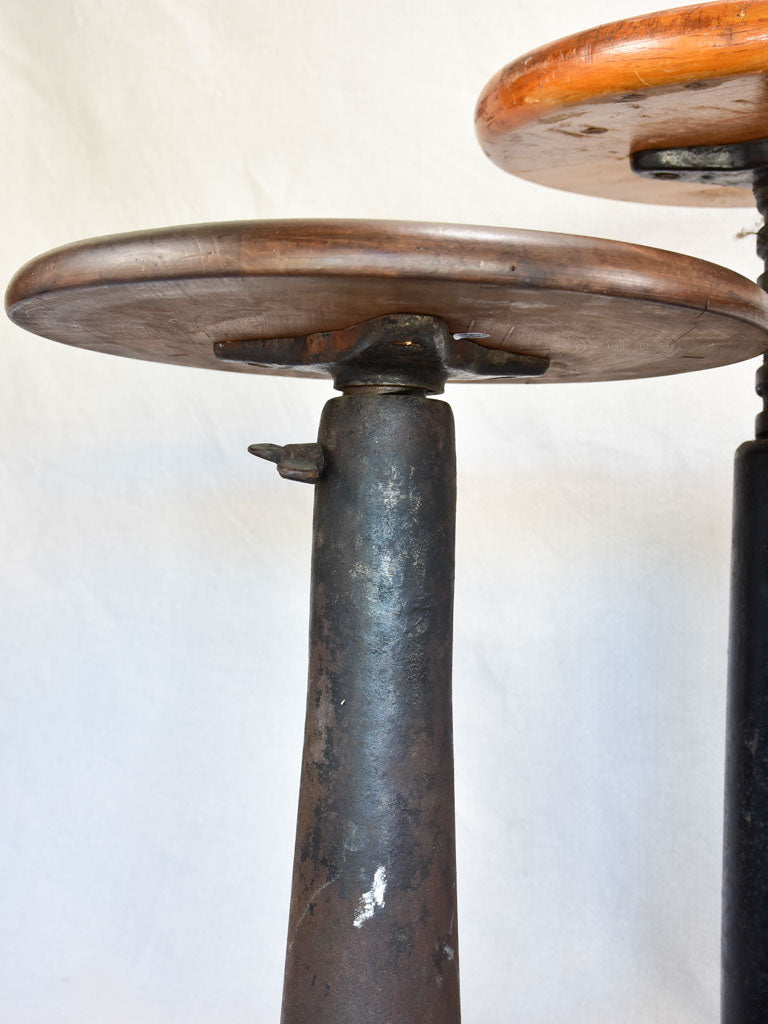 Collection of three sewing stools with cast iron bases "Singer"
