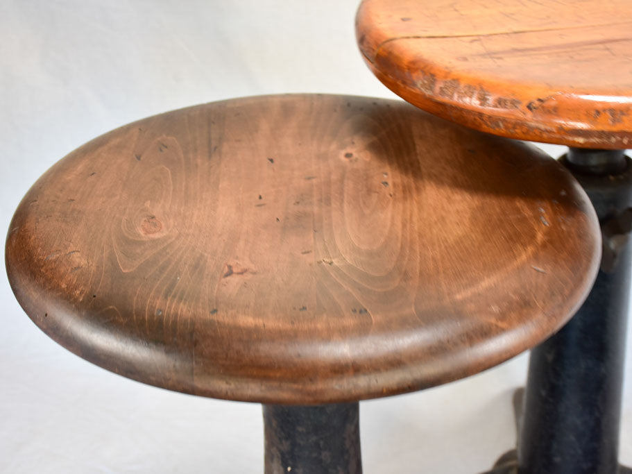 Collection of three sewing stools with cast iron bases "Singer"