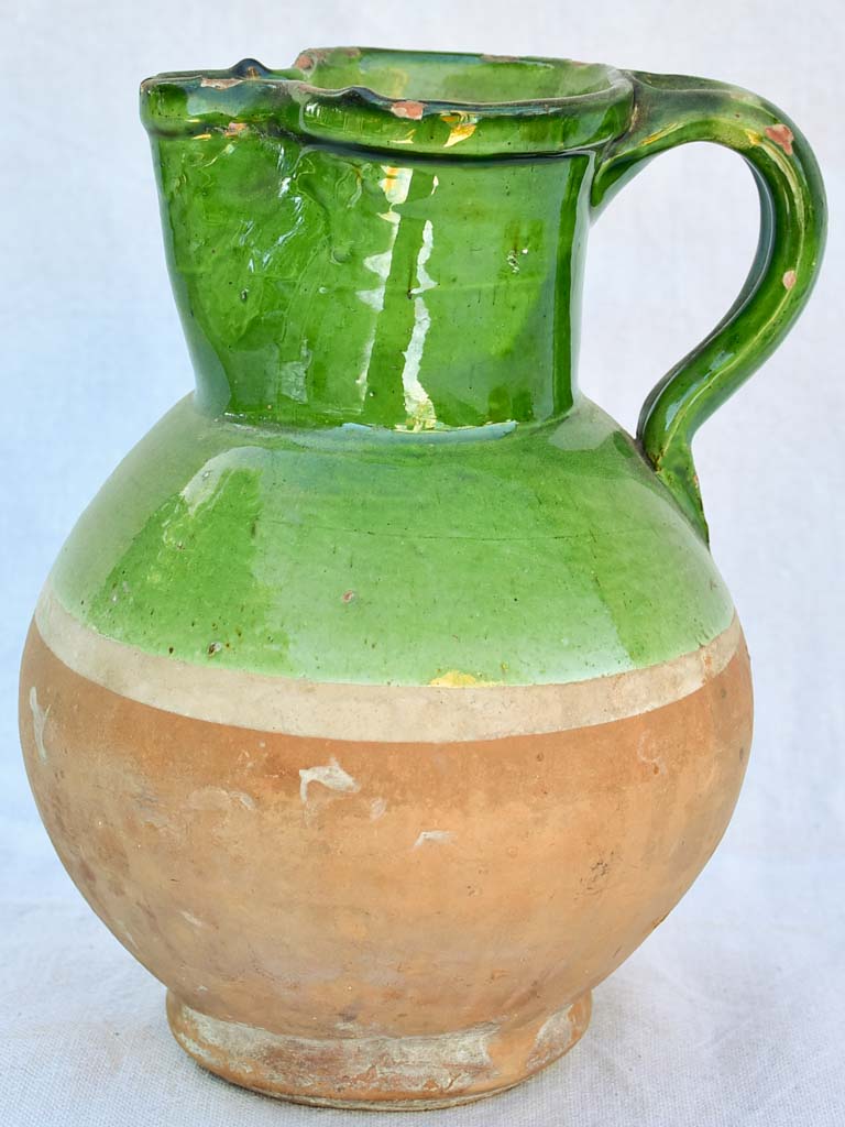 Antique French water pitcher with green glaze and pinched beak 10¼"