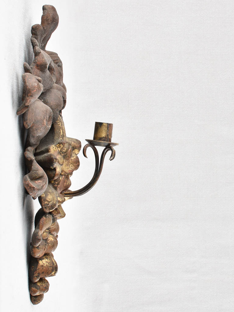 Pair of cast iron candle appliques 17"