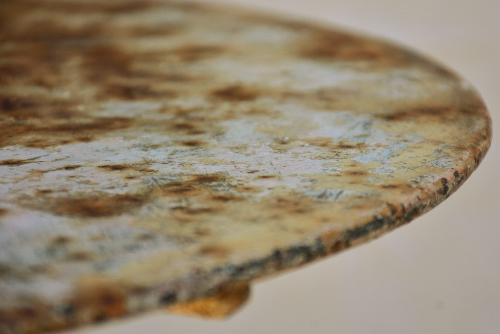 Early twentieth century French garden table with looped base 20¾"