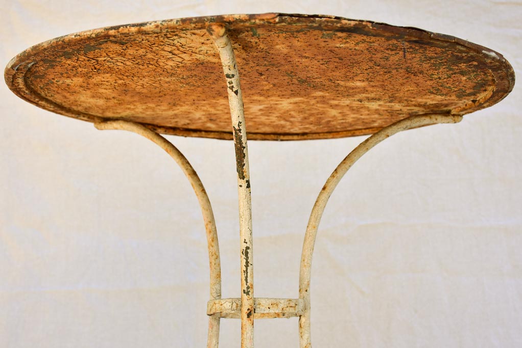 Early twentieth century French garden table with looped base 20¾"