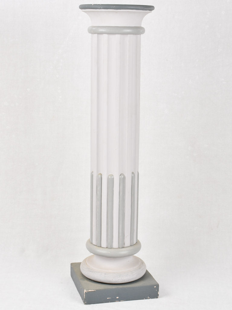 Orchid-displaying rustic timber pedestal