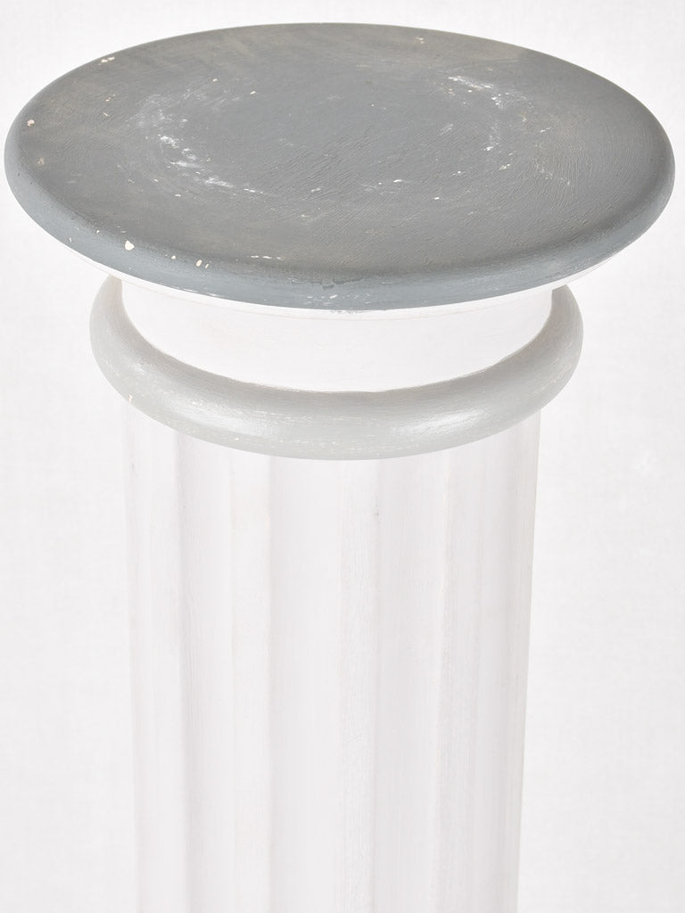 Old, aesthetically weathered timber pedestal