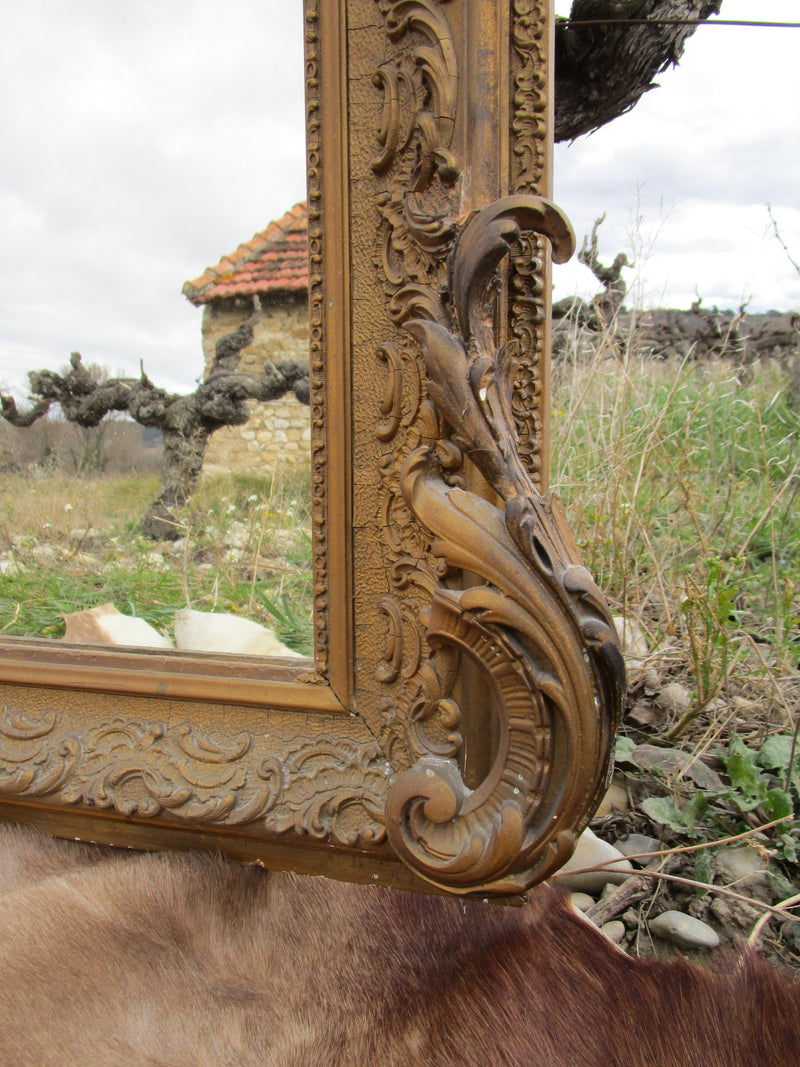 Louis XV style gilt mirror