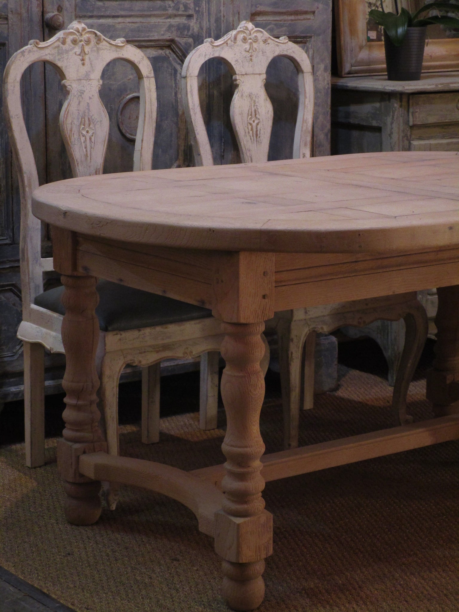 Extendable French stripped oak oval dining table