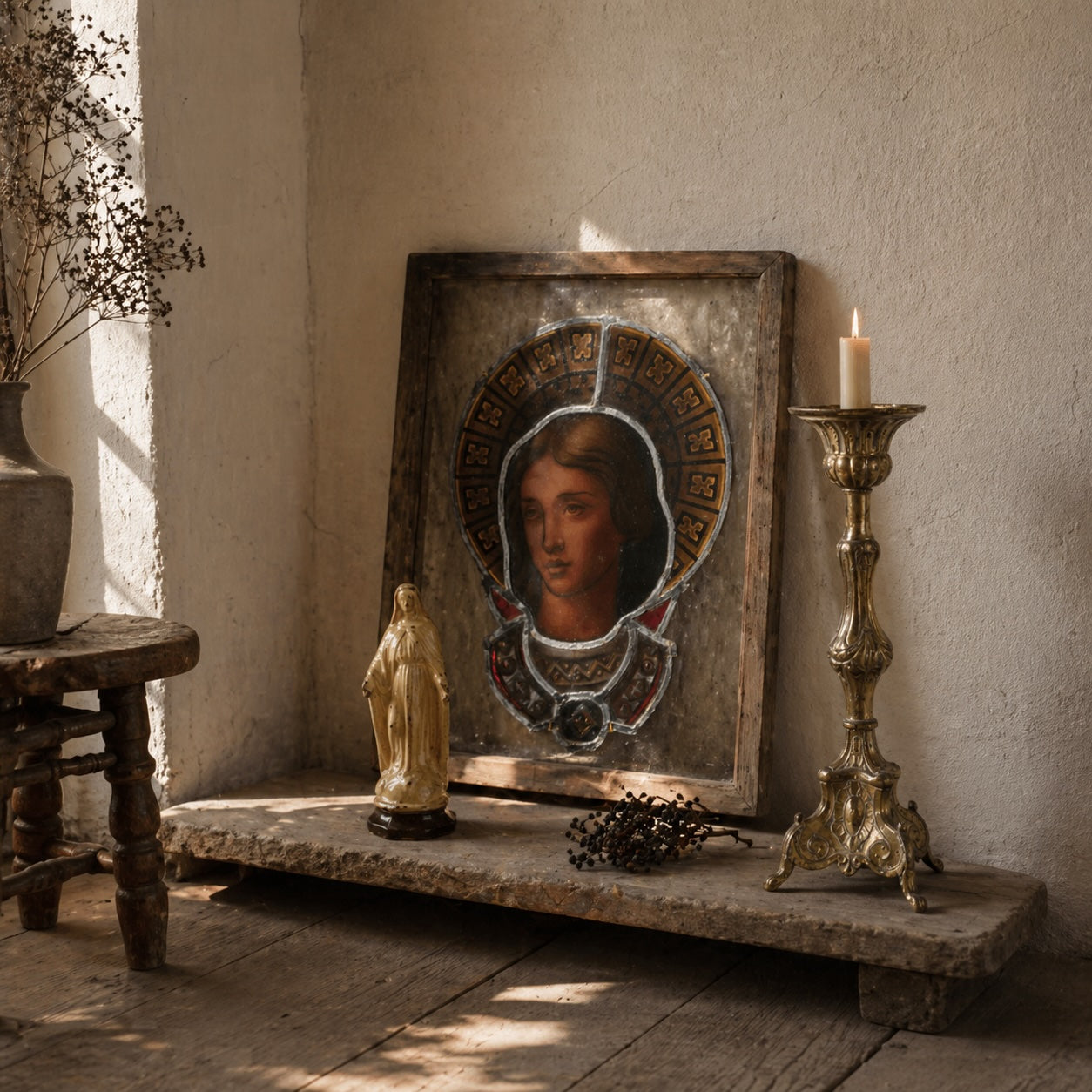Antique French devotional vignette with glazed terracotta Virgin Mary figure, Gothic Revival stained glass panel, and brass candlestick