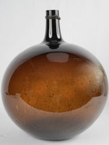 Antique amber-colored blown glass vase