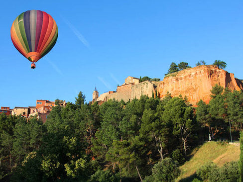 Float in the clouds above the ochre cliffs of Roussillon