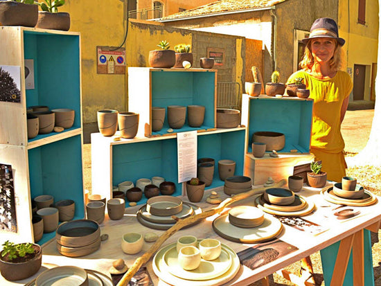 Peruse artisan pottery at the ceramics market of Pernes-les-Fontainess