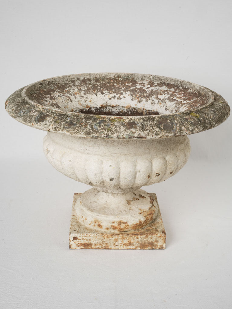 Elegant mossy-edged campana planter  