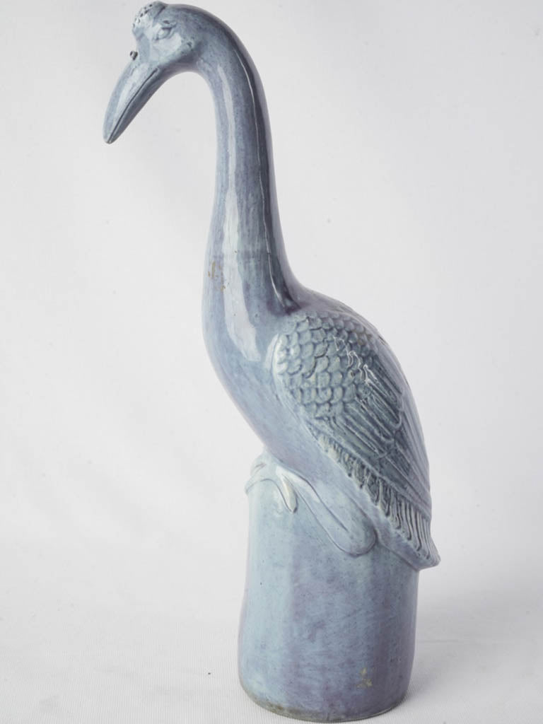 Graceful stylized crane artwork  