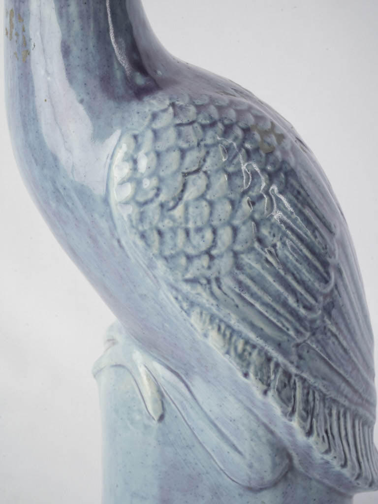 Rhythmic feather-patterned bird sculpture  