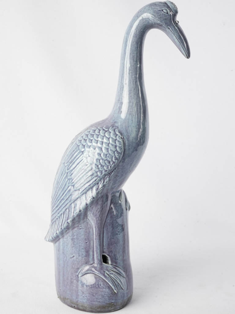 Antique-style blue-glazed ceramic figurine  