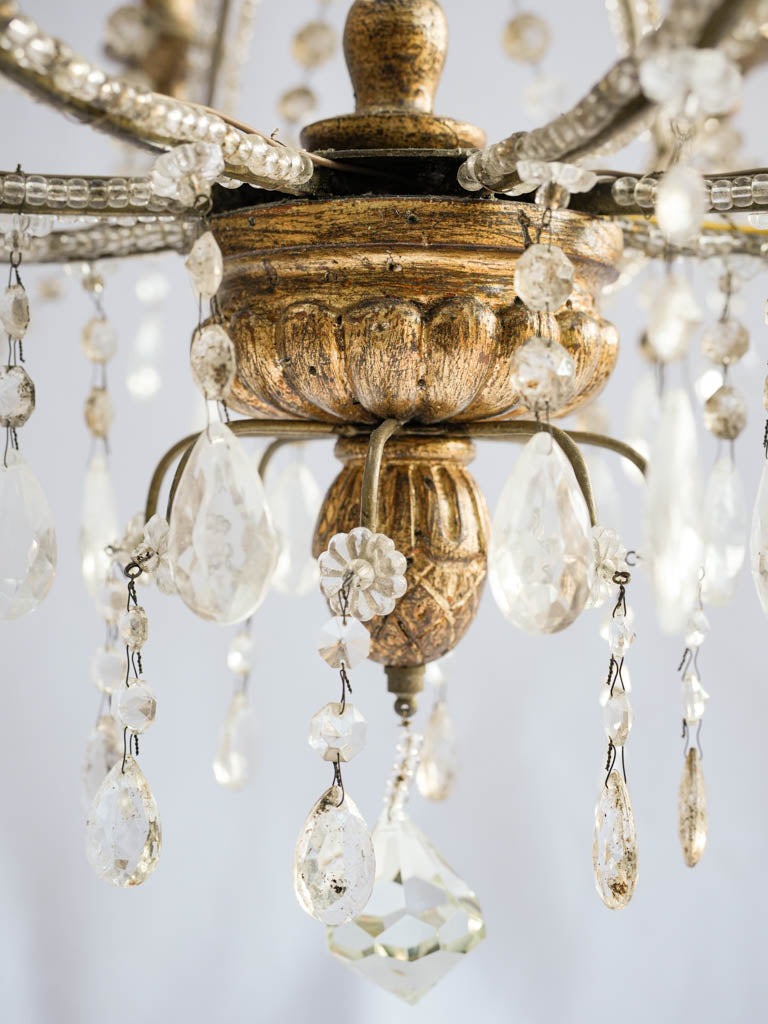 Gilt cup adorned chandeliers