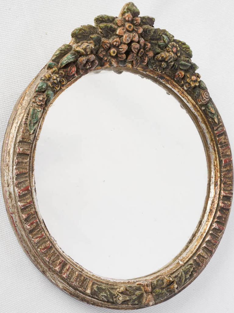 Antique neoclassical round mirror