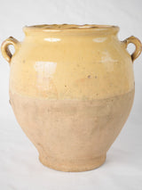 Time-worn tapered base confit pot