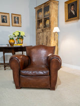 Pair of restored antique French leather club chairs