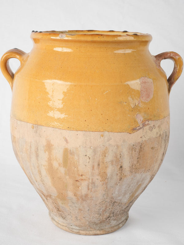 Antique yellow-glazed French confit pot