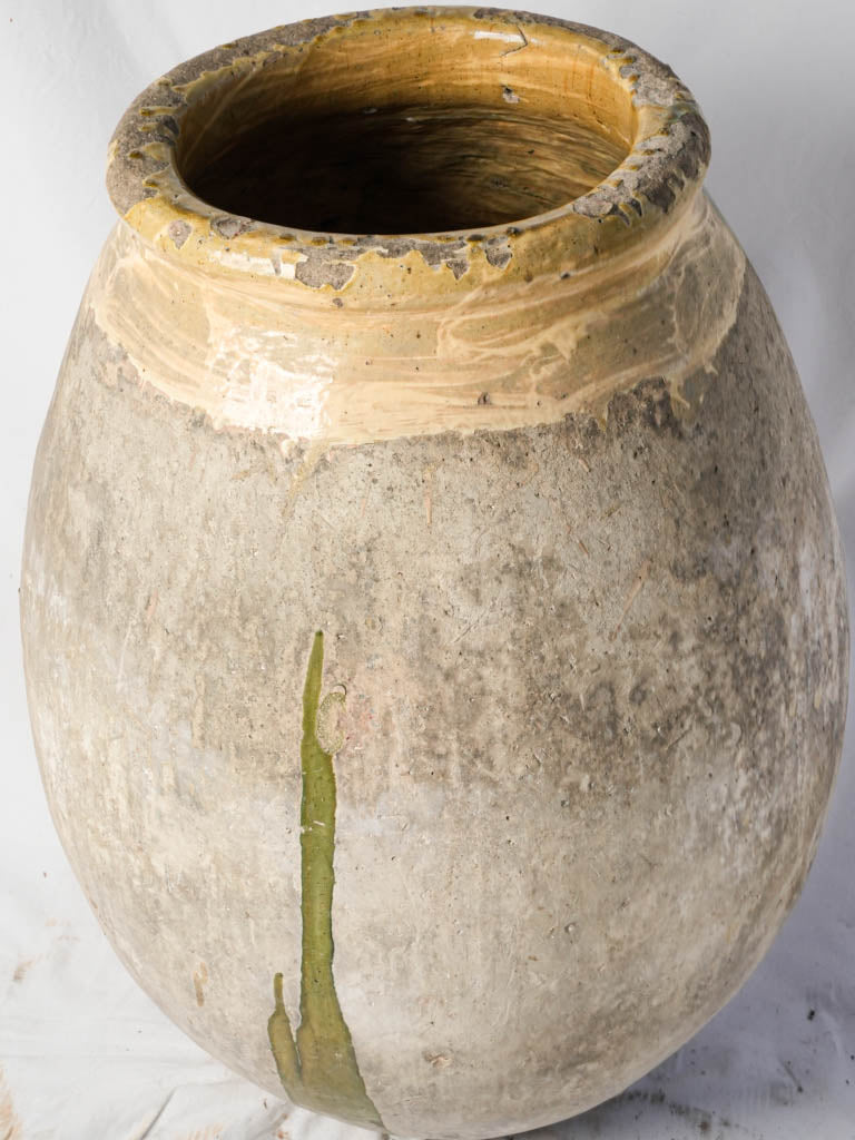 Textured ochre-accented Biot jar  