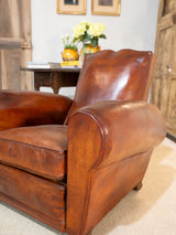 Pair of antique French leather club chairs - moustache back
