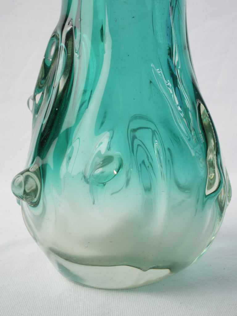 Teal-tinted flame-like petal vase  