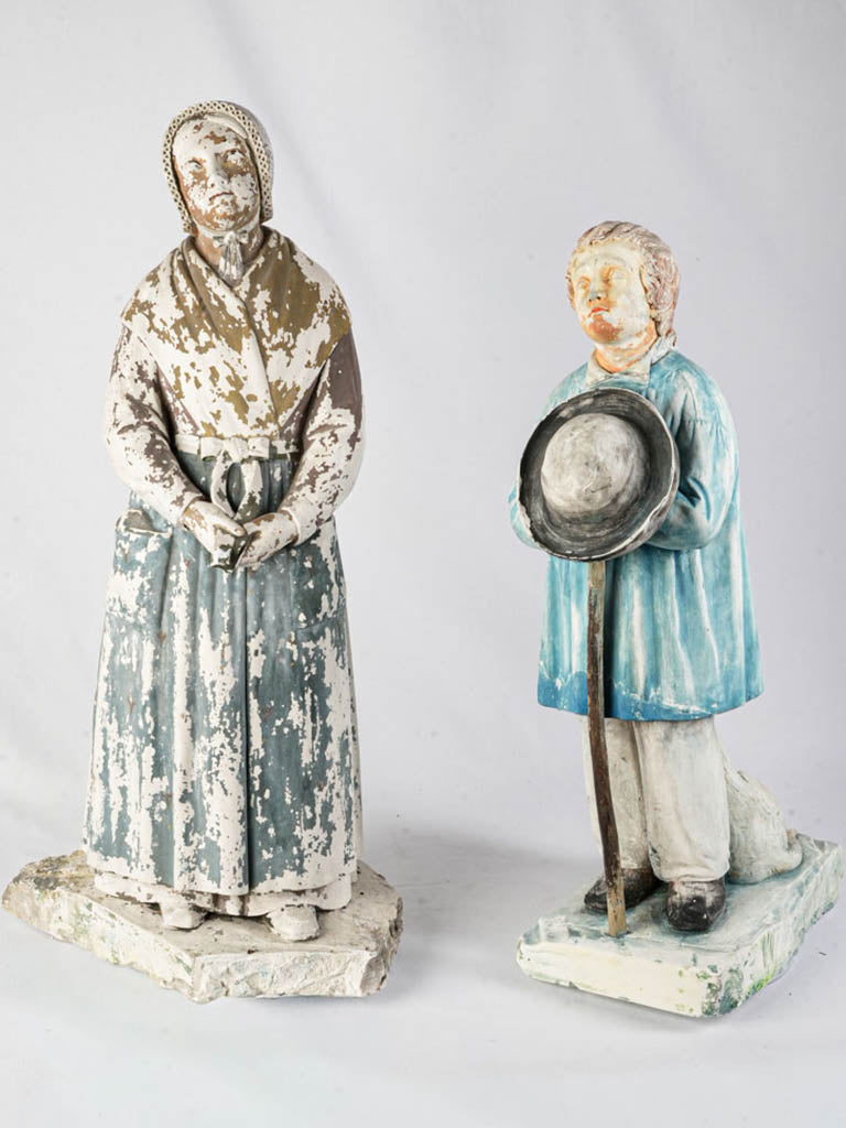 Timeworn painted plaster devotional figures  