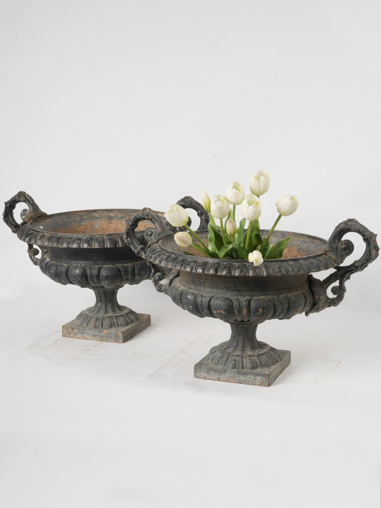 Intricate cast iron planters