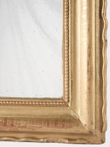 Elegant pearl-bordered salon style mirror